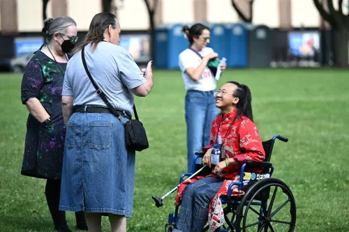 Bee Wang (right), Theological Student Advisory Delegate from Louisville Theological Seminary, attends Healing Not Harm: A Walk to End Gun Violence. Photo by Kristen Gaydos