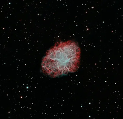Crab Nebula and dark space around it punctuated by stars