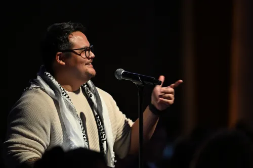 Brandon Tacadena, Ruling Elder Commissioner, moves for an amendment to GAO-01 during the 12th plenary on July 1, 2026. 