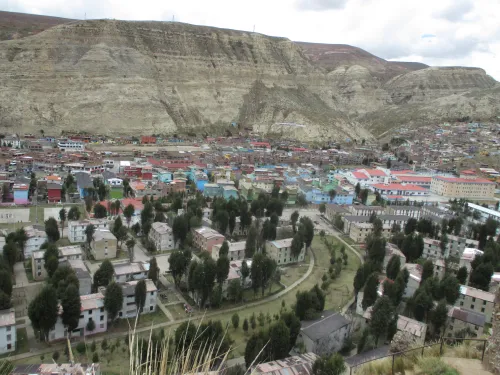 buildings with a mountain looming in the background