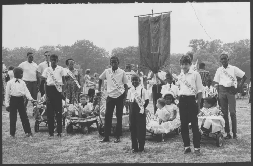 Kids in front of a decorated float before the 134th annual Brooklyn Sunday School Union parade.
