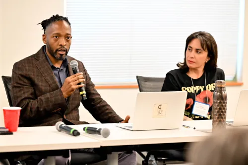 Rev. Jermaine Ross-Allam speaks during panel discussion