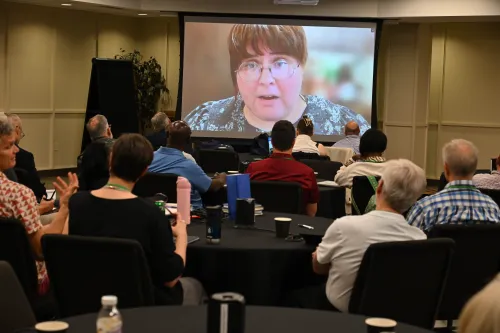 Indigenous activist, Mackenzie Roberts, addresses the 2026 AI & Church Summit over Zoom. 