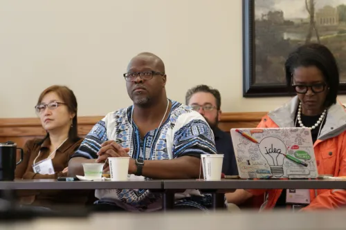 Rev. Grace Kim (left), Rev. Jacob Douillez (back row), Rev. Cary James Jr. (middle) and Rev. Stephanie Hand (right) consider the impact on AI and their communities.