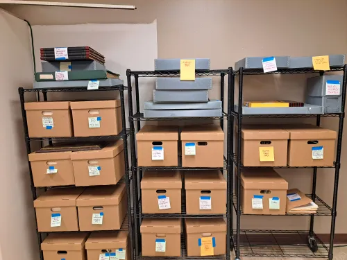 24 cubic feet of records, sorted on shelves