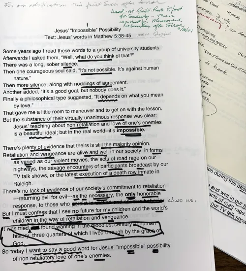 A close-up of the first page of Z Holler's sermon "Jesus 'Impossible' Possibility." The copy is marked up in black marker and green pen.