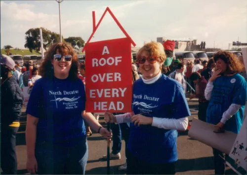 Adams at a rally advocating on behalf of the unhoused. 