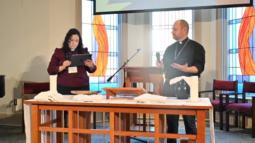The Revs. Christian Cosby and Kris Schondelmeyer lead liturgy in opening worship.