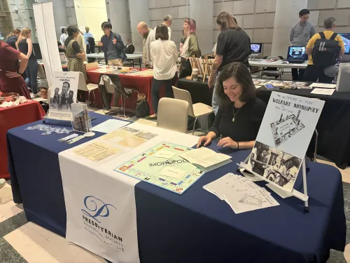 Olivia Cacchione tables at the Archives Fair event on October 14 at the Central Parkway library in Philadelphia.