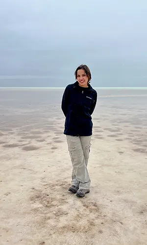 Kyra Chang YAV posing in front of ocean