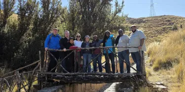 GEP, PDA and Ecumenical staff of PLW on bridge in Andes Mountains