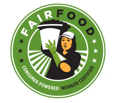 A green logo with a female worker holding up a bucket