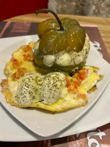 a stuffed pepper on a plate