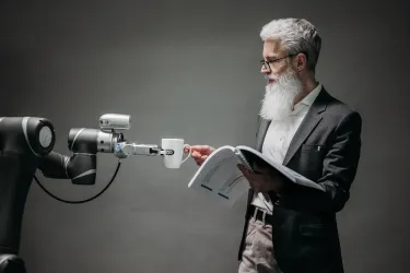 Robot serving a man a cup of tea or coffee