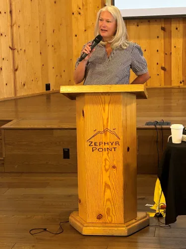 Kris Thompson leads worship for PL&W Board