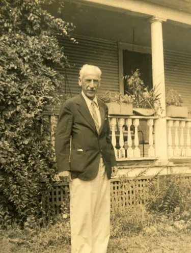 Dr. Edward Haymaker stands in the front yard of his Missouri home in the 1930s. 