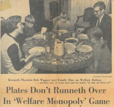 Newspaper clipping with image of family at a dinner table eating a "welfare monopoly" meal. Headline reads "Plates don't runneth over in Welfare Monopoly game." Published by the Miami Herald in December 1969.