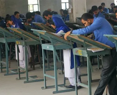 Two young women in the drafting class