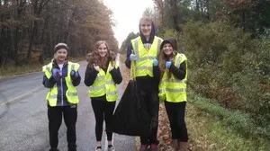 Frame Memorial picking up litter