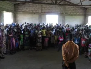 A young adult member of a Presbyterian congregation in northern Ghana leading a weekday prayer for the congregation. Young adults in their 30s and 40s eagerly lead many ministries and small groups in local congregations.