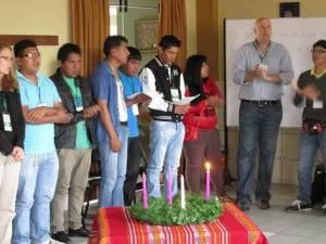 Mission co-worker Jed Koball (second from right) leads a song during morning devotions