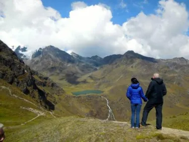 Jed and Jenny look out toward the Huaytapallana glacier, which is rapidly melting.