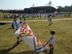 Hyeyoung and Sahn dance with a scarf copy of a peace scarf made by North Korean women