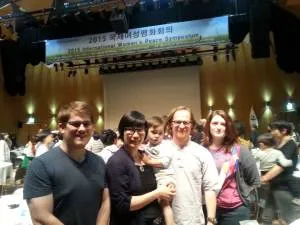 Hyeyoung, Kurt, and Sahn attend the Peace Symposium with Kalyn and Jordan