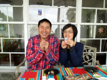 A newly married couple drinking tea around my table