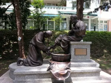 A Bronze sculpture of Jesus' washing of feet in front of our dormitory