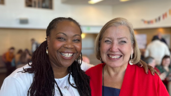 Two women smiling
