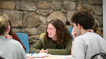 College student smiles during workshop