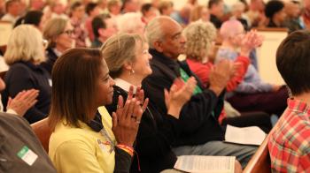 A crowd seated at a gathering