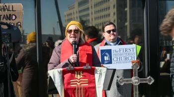 Pastor speaks outside of the Philadelphia office of Immigration and Customs Enforcement. 