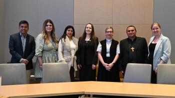 Panelists at a side event of the International Migration Review Forum on faith-based responses.