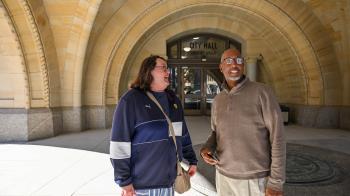 Ann Gibbs of COLA &amp; Jimmy Hawkins of PL&amp;W's Advocacy Offices tour the route for Saturday morning's walk. Photo by Rich Copley.