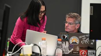 Committee leaders Joanna Kim (left) and Steve Watts (right) on the second day of GA227 meetings. (Photos by Rich Copley)