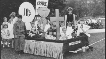 Kids in front of a decorated float before the 134th annual Brooklyn Sunday School Union parade.