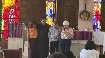 Praying over the installation of newly elected Moderator Jessé Oliveira of the IPU in Brazil. (All photos by Jed Koball)