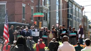 Bishop Cynthia Moore-Koikoi gives the closing prayer and benediction over the crowd.