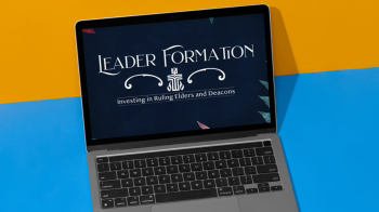 An image of a laptop dispalying the words Leader formation against an orange and blue backdrop.