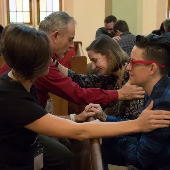 1001 NWC people greeting during worship