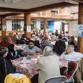 People sitting around tables