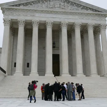 a group standing outside the congress building