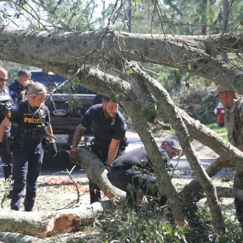 Florida Army National Guard Soldiers and Pensacola Police Department Police Officers conduct joint route clearance operations after the damage made by Hurricane Isaias.