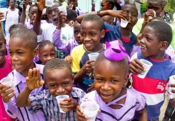 children drinking clean water