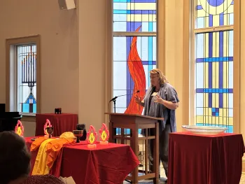 The Rev. Karen Fitz de la Barge preaches on refining fire at NAPCW gathering 