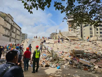 The image shows earthquake destruction in Venezuela, including destroyed buildings and roads. Volunteers and first responders are shown removing debris.