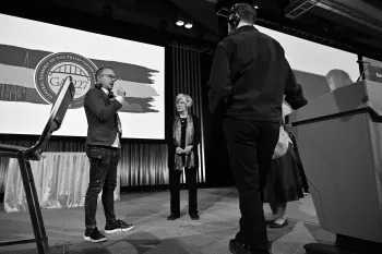 Nathan Young works with General Assembly Operations Committee moderator Anne Wilson and other committee leadership during plenary rehearsal on June 28th. Photo by Rich Copley.