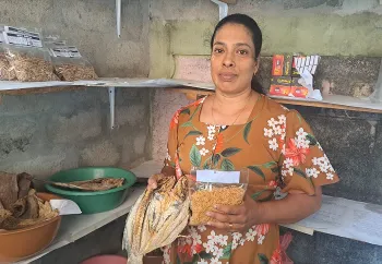 woman holding gardening market items